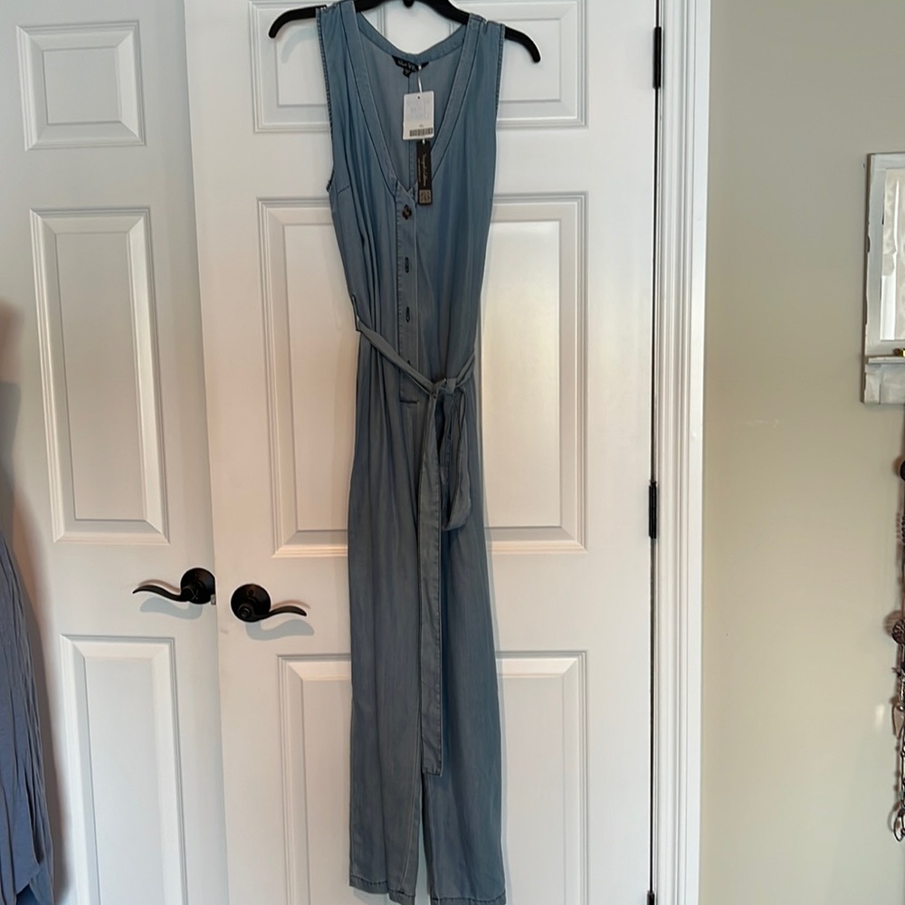 womens size L  faded blue jean looking jumpsuit  NEW with tags